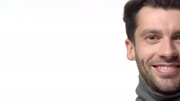 Slowmotion Closeup Young Mature Confident Male with Beard Looking Camera Start Smiling Pleased alt
