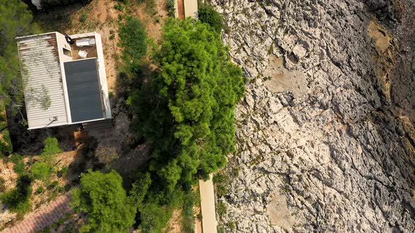 Aerial view of man running at Losinj costaline, Croatia. alt