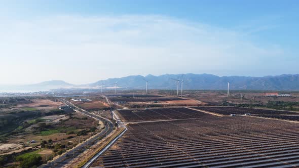 Developing Vietnam countryside, solar panels and wind turbines, Phan rang. Aerial alt