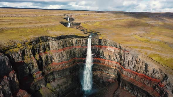 Flying Above the Hengifoss Waterfall in East Iceland alt