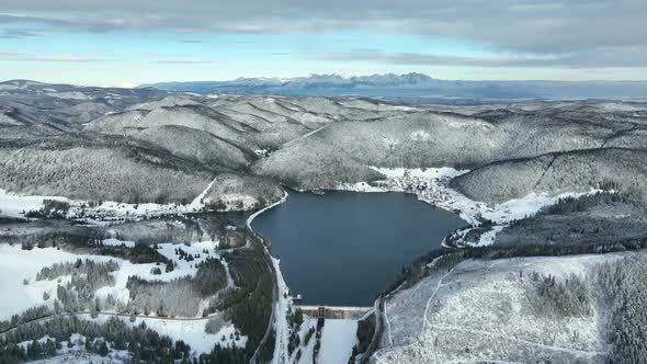 Aerial view of the Palcmanska Masa reservoir in the village of Dedinky in Slovakia alt