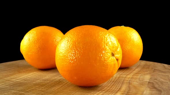 Oranges on a Black Background alt