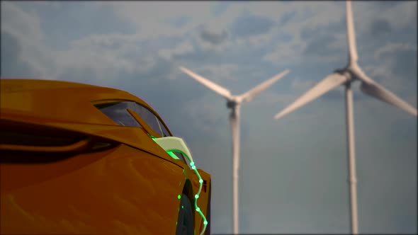 Generic electric orange car charging with wind turbines in background.