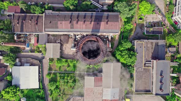 A City with Residential Buildings and a Large Pipe alt
