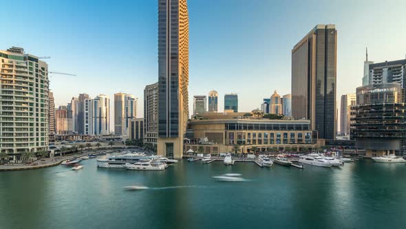Aerial Vew of Dubai Marina with Shoping Mall Restaurants Towers and Yachts Timelapse United Arab alt