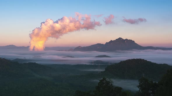 Morning time with fog above the mountain.