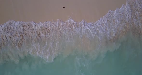 Tropical overhead copy space shot of a white paradise beach and blue water background in best qualit alt