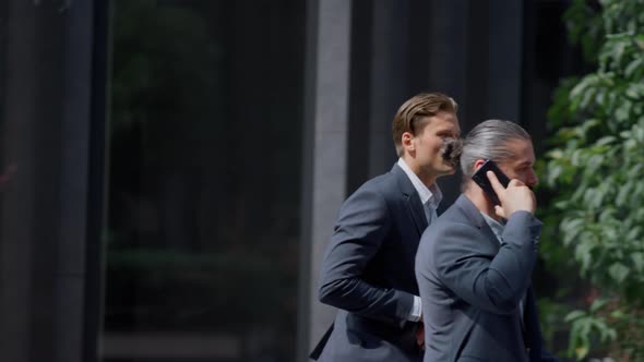 Hurrying Business Man Being Late for Professional Summit in Contemporary Office alt