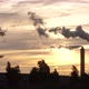 Smoke rises from an industrial smokestack at sunset - VideoHive Item for Sale