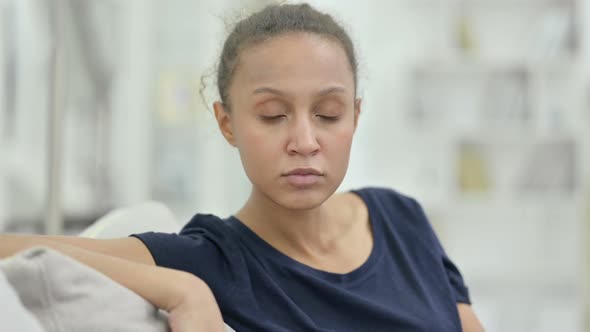 Close Up of Young African Woman Looking at the Camera alt