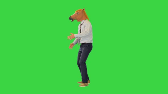 Comic Male Person in Horse Mask Do Robot Dance Funny Businessman or Office Worker Cheering Alone on