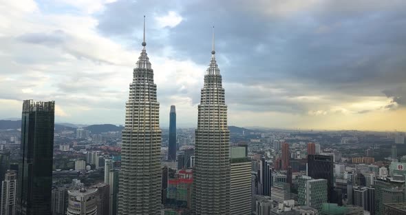 Close Petronas Twin Towers Footage, Done By Drone From the Air, the Drone Goes Around the Towers