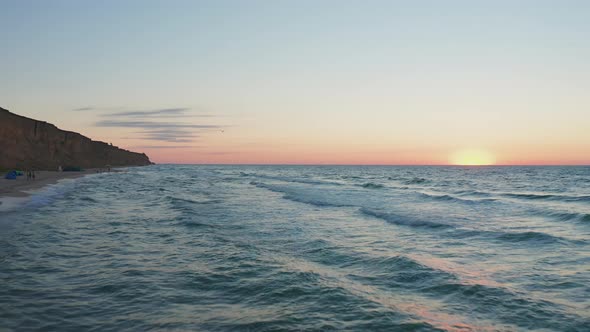 Seashore Surf Waves at the Sunset