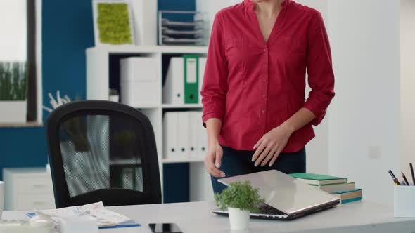 Project Manager Working with Online Sales Statistics on Laptop alt