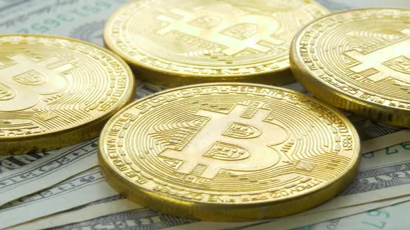 Golden Bitcoin Cryptocurrency on Dollar Money