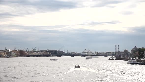 Boats and ships on the Neva River in St. Petersburg in the summer