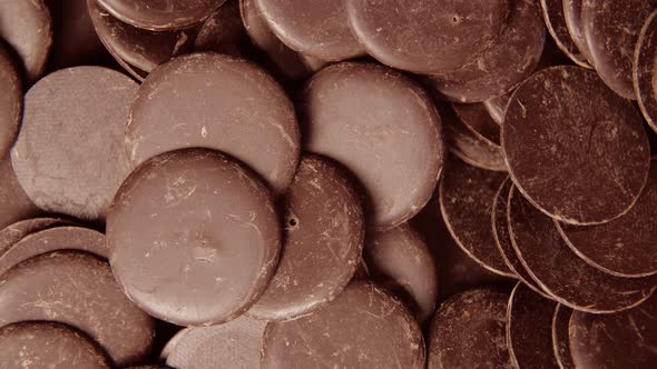 Chocolate Granule Chips Rotating Super Closeup Topdown View alt