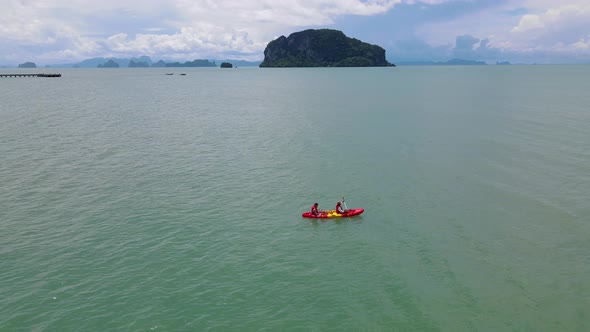 Men and Women in Kayak in Thailand in the Ocean Near Phuket Thailand alt