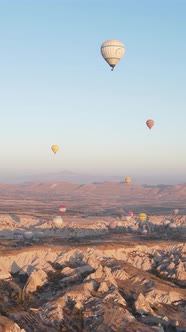 Vertical Video of Hot Air Balloons Flying in the Sky Over Cappadocia Turkey alt