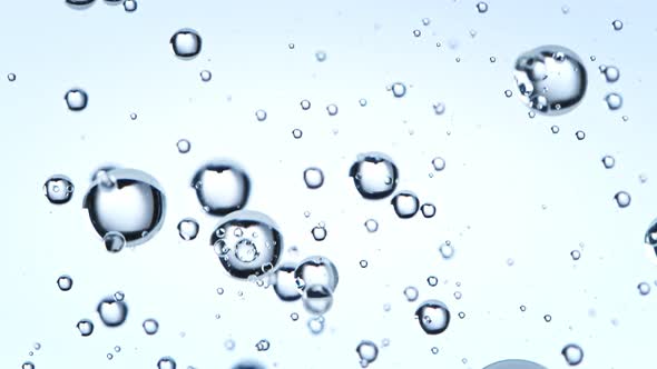 Super Slow Motion Macro Shot of Rising Various Bubbles in Water at 1000 Fps alt