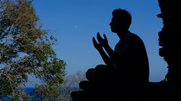 Praying Young Man Silhouette alt