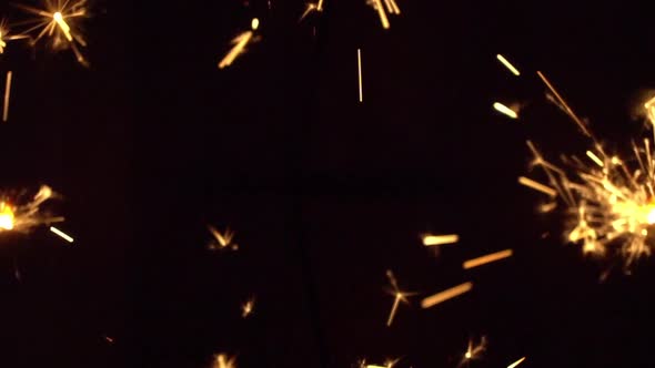 Holiday Sparks at Black Background. Beauty Bengal Fireworks