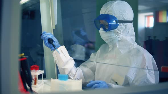 Female Doctor Work in Laboratory, Developing a Vaccine. Coronavirus, COVID-19, 2019-Ncov Medicines alt