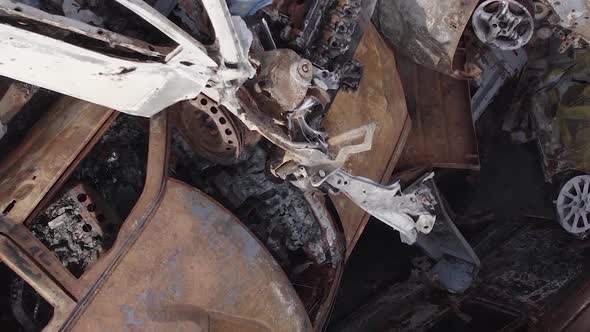 Vertical Video of Burned and Shot Cars During the War in Ukraine alt