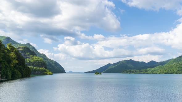 Beautiful lake reservoir and mountain in Kanchanaburi, Thailand - Time Lapse