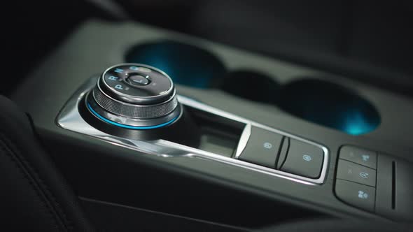 Closeup Black Car Control Panel with Buttons Inside Automobile alt