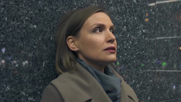 Depressed Lady Standing Near City Wall at Night, Feeling of Loneliness, Problem alt