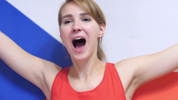 Czech Young Woman Celebrating While Holding the Flag of Czech Republic in Slow Motion alt