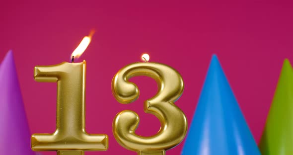 Burning Birthday Cake Candle Number 13