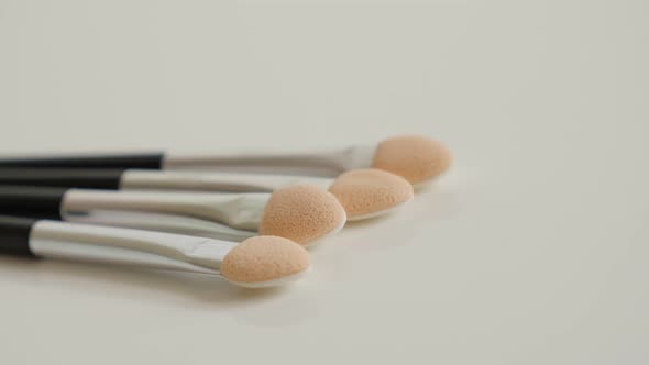 Assorted accessories for beauty treatment  4K 2160p 30fps UltraHD panning video - Slow pan over eyes alt