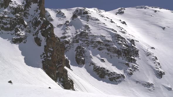 Snowy Rocky Cliff alt