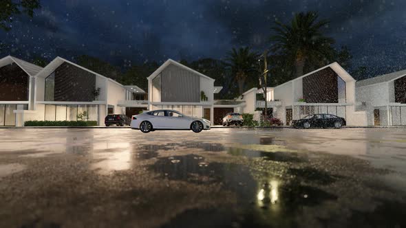 Car Lights On A Quiet Street In Heavy Rain