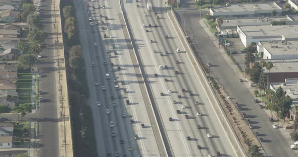 Aerial helicopter shot, tracking across a vast, icy Alaskan sea at golden hour, drone footage, sunse