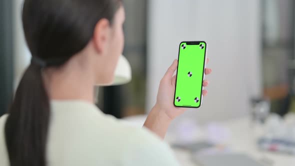 Woman Using Smartphone with Chroma Screen Mock Up alt