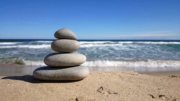 Stacked zen stones on the beach