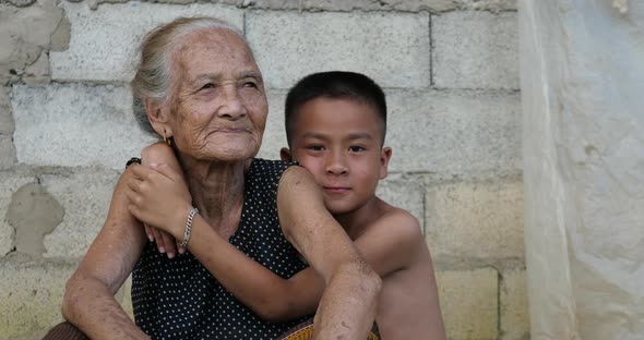 Grandson Hugs His Grandmother alt