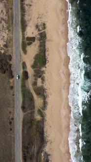 Aerial view to a road near to the sea