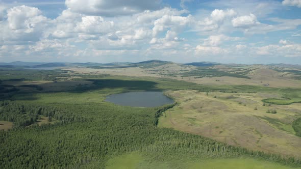Scenic Landscape with Ural Mountains Green Forest and Blue Lake