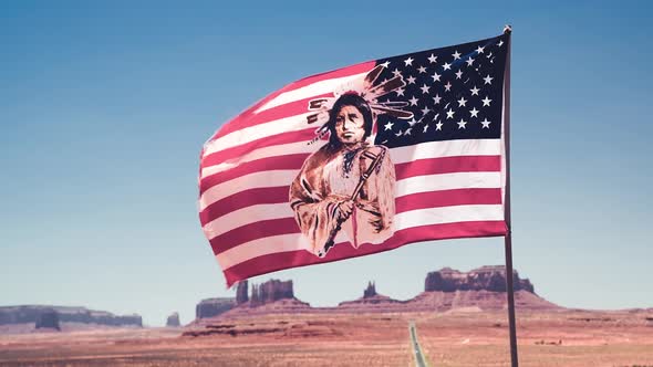 American Indian Flag on the Road to Monument Valley Slow Motion alt