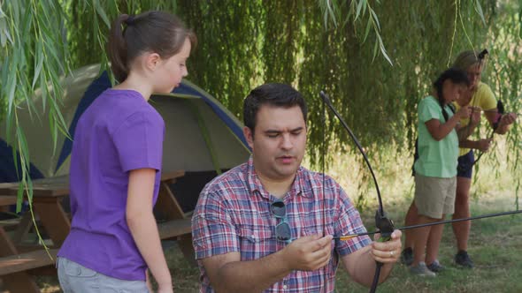 Kids at summer camp doing archery