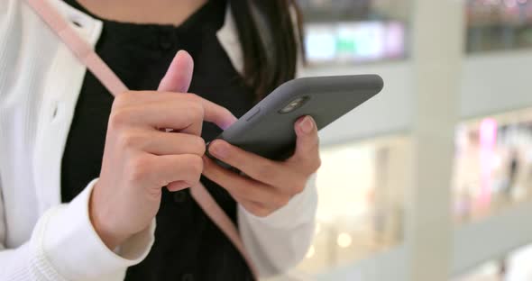 Close up of Woman use of smart phone alt