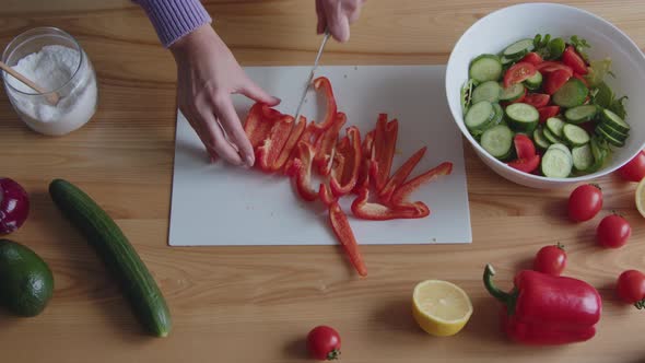 Slicing Red Pepper for Salad