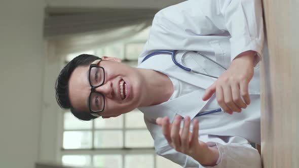 Male Doctor Video Call And Consult Client Online alt