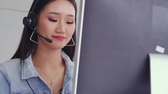 Customer Support Agent or Call Center with Headset Talking to Customer on Phone alt