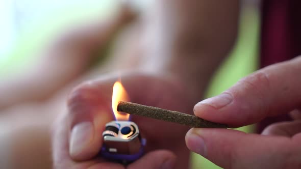 Therapist Performing Moxibustion Procedure at Health Center alt