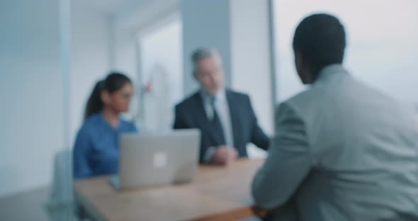 Multi-ethnic couple of hiring managers doing recruit job interview in office alt